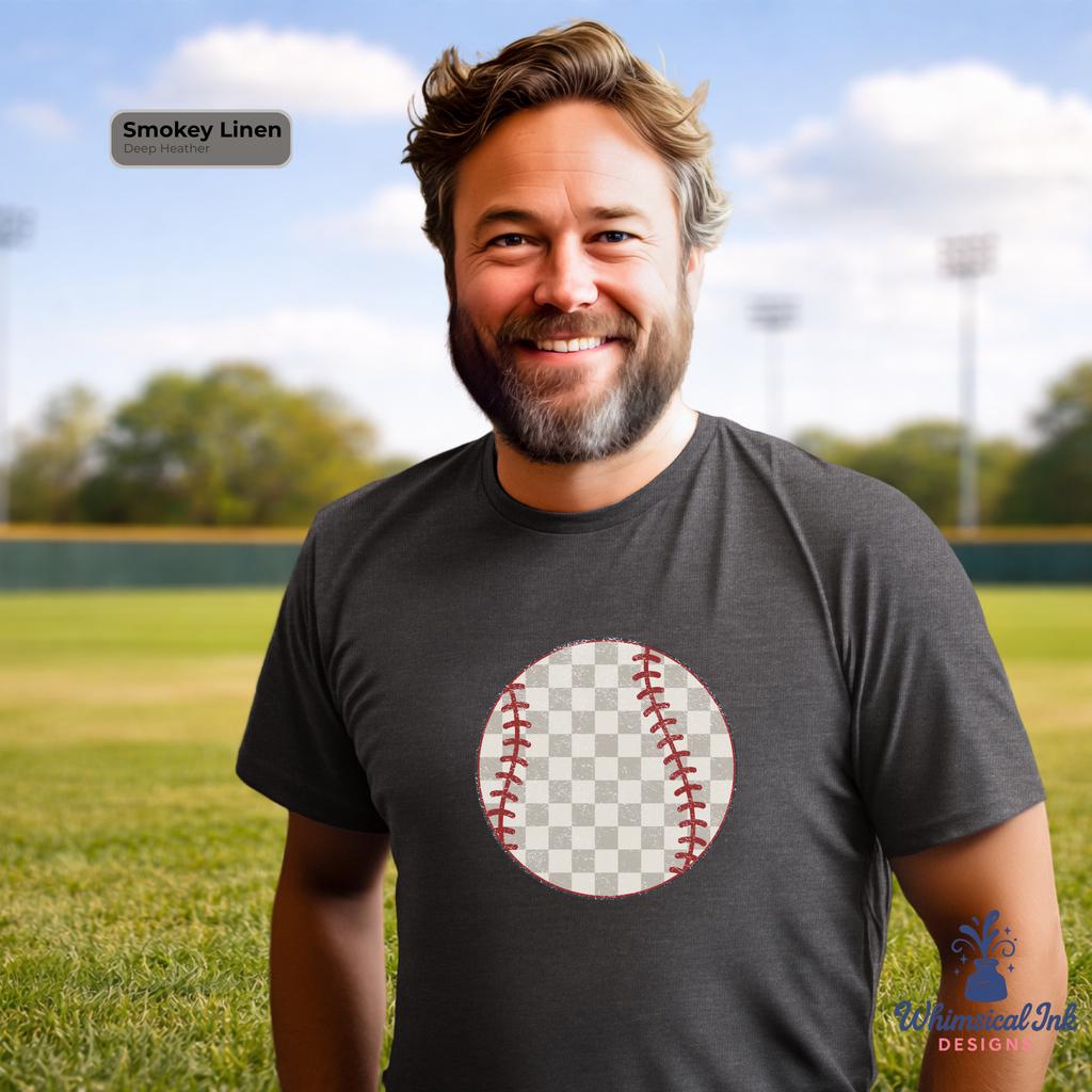 Man wearing a dark gray t-shirt with a baseball graphic on a sports field