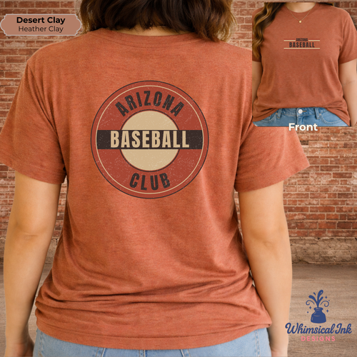 Person wearing a red t-shirt with 'Arizona Baseball Club' design, standing against a brick wall.