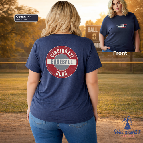 Person wearing a navy blue t-shirt with 'Cincinnati Baseball Club' design on a baseball field.