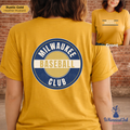 Yellow t-shirt with 'Milwaukee Baseball Club' design on a brick wall background