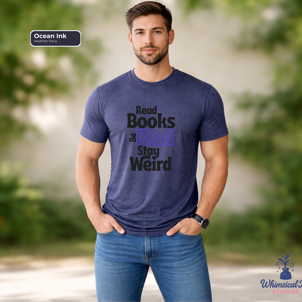 Man wearing a blue t-shirt with text 'Read Books Be Kind, Stay Weird' against a blurred natural background.